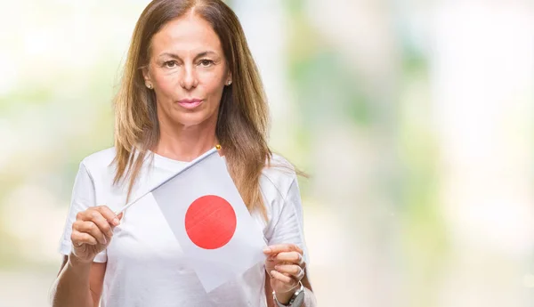 Medelåldern Spansktalande Kvinna Som Håller Flagga Japan Över Isolerade Bakgrund — Stockfoto