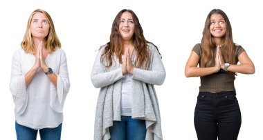Kolaj yalvarıyor ve umut ifade yüzünde çok duygusal ve endişe ile birlikte elleriyle dua beyaz izole arka plan üzerinde üç genç güzel kadın grup. Bağışlanmak. Din kavramı.