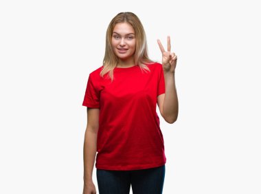 Gösterilen ve parmakları ile işaret izole arka plan üzerinde beyaz kadın ikincisi ise kendinden emin ve mutlu gülümseyerek.