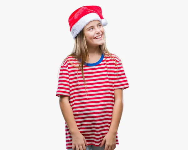 Mooi Meisje Dragen Kerstmuts Geïsoleerd Achtergrond Zoek Weg Aan Kant — Stockfoto