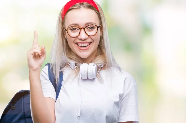 Jovem Estudante Loira Usando Óculos Mochila Sobre Fundo Isolado Apontando — Fotografia de Stock