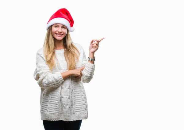 Jovem Mulher Loira Bonita Usando Chapéu Natal Sobre Fundo Isolado — Fotografia de Stock