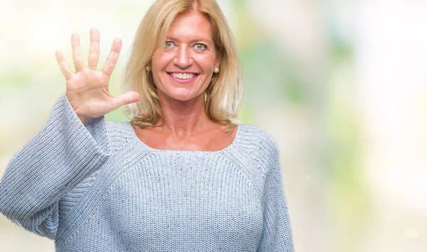 Middelbare Leeftijd Blonde Vrouw Dragen Winter Trui Geïsoleerde Achtergrond Weergeven — Stockfoto