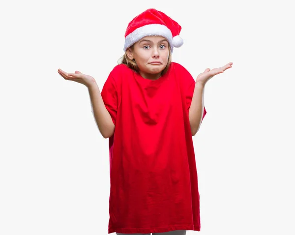 Молодая Красивая Девушка Рождественской Шляпе Изолированном Фоне Невежественное Запутанное Выражение — стоковое фото