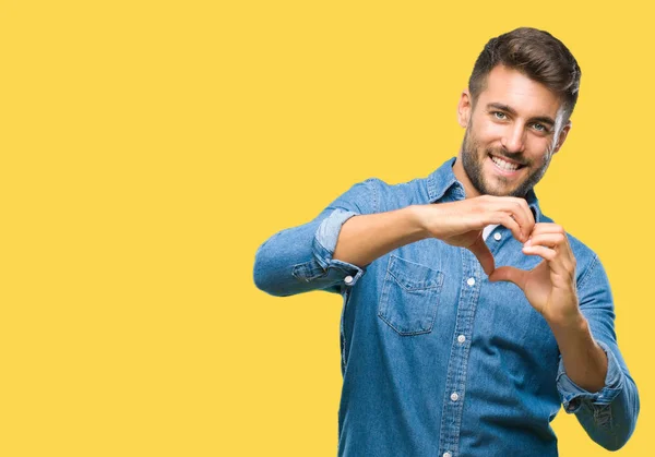 Joven Hombre Guapo Sobre Fondo Aislado Sonriendo Amor Mostrando Símbolo —  Fotos de Stock