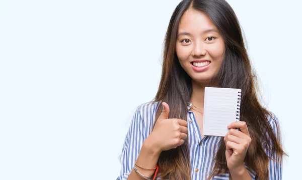 Joven Asiático Mujer Celebración Notebook Sobre Aislado Fondo Feliz Con —  Fotos de Stock
