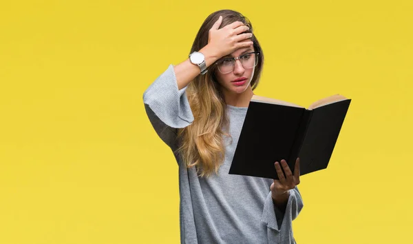 Young Beautiful Blonde Woman Reading Book Isolated Background Stressed Hand — Stock Photo, Image