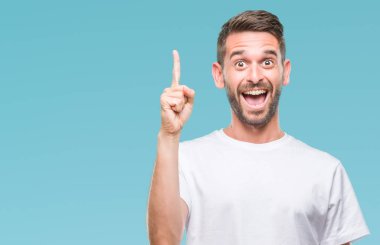 Yakışıklı delikanlı ile başarılı fikir parmağı yukarıyı izole arka plan üzerinde. Çıktıktan ve mutlu. Bir numara.