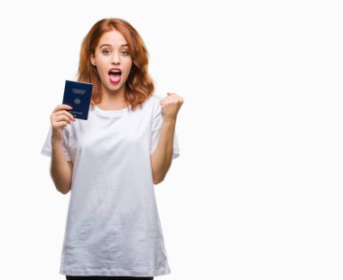 Duygu tezahürat pasaport Almanya'nın gurur çığlık ve zafer ve başarı çok heyecanlı, kutluyor izole arka plan üzerinde tutan genç güzel kadın