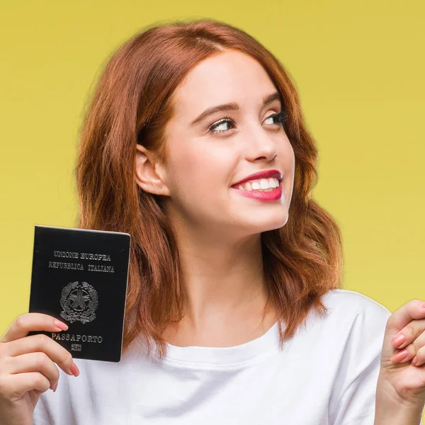 Joven Hermosa Mujer Sosteniendo Pasaporte Italia Sobre Fondo Aislado Muy —  Fotos de Stock