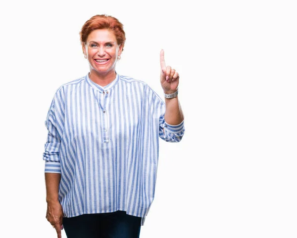 Atrractive Senior Caucasian Redhead Woman Isolated Background Showing Pointing Finger — Stock Photo, Image