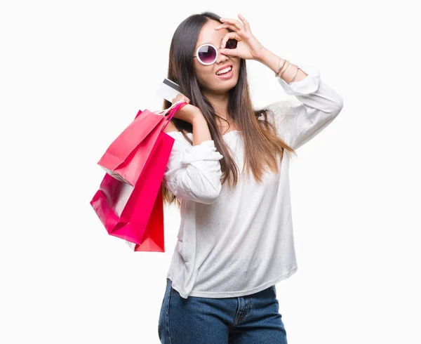 Young Asian Woman Holding Shopping Bags Sales Isolated Background Happy — Stock Photo, Image