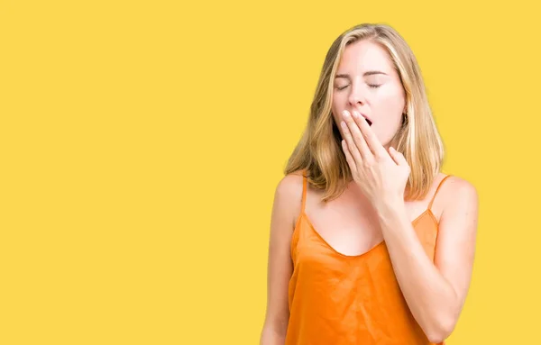 Beautiful Young Woman Wearing Orange Shirt Isolated Background Bored Yawning — Stock Photo, Image