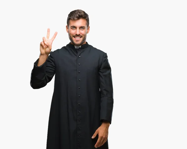 Junger Katholischer Christlicher Priester Über Isoliertem Hintergrund Der Mit Fingern — Stockfoto