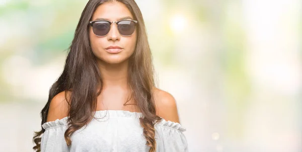 Young Beautiful Arab Woman Wearing Sunglasses Isolated Background Serious Expression — Stock Photo, Image