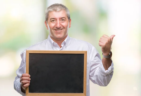 Handsome Senior Teacher Man Holding Blackboard Isolated Background Pointing Showing — Stock Photo, Image