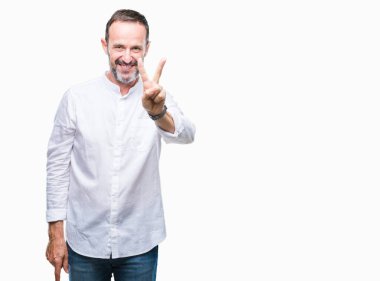 Orta yaş ağarmış komuta sizde gösterilen ve parmakları ile işaret izole arka plan üzerinde ikincisi ise kendinden emin ve mutlu gülümseyerek.