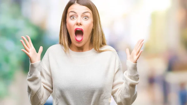 Young Beautiful Woman Casual White Sweater Isolated Background Celebrating Crazy — Stock Photo, Image