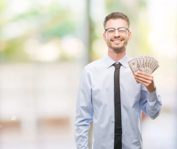 Joven Hombre Negocios Hipster Sosteniendo Dólares Con Una Cara Feliz — Foto de Stock