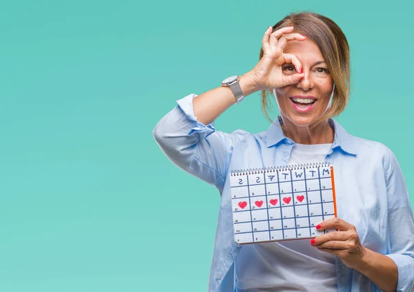 Medelåldern Senior Spansktalande Kvinna Som Håller Menstruation Kalender Över Isolerade — Stockfoto