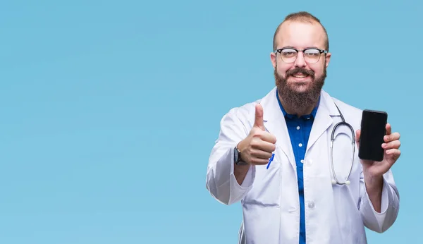 Young Doctor Man Showing Smartphone Screen Isolated Background Happy Big — Stock Photo, Image