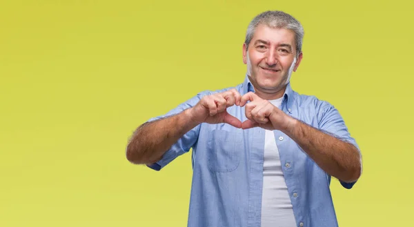 Handsome Senior Man Isolated Background Smiling Love Showing Heart Symbol — Stock Photo, Image