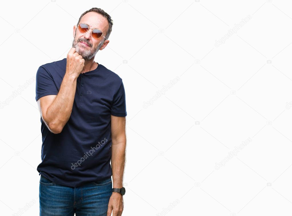 Middle age hoary senior man wearing sunglasses over isolated background with hand on chin thinking about question, pensive expression. Smiling with thoughtful face. Doubt concept.