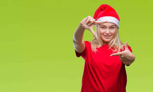 Mujer Caucásica Joven Con Sombrero Navidad Sobre Fondo Aislado Sonriendo —  Fotos de Stock