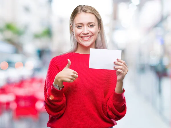 Unga Blonda Kvinnan Hålla Blankt Papperskort Över Isolerade Bakgrund Glad — Stockfoto