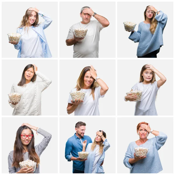 一群人在孤立的背景下吃爆米花 用手在头上强调 羞愧和惊讶的脸震惊 愤怒和沮丧 因错误而恐惧和不安 — 图库照片