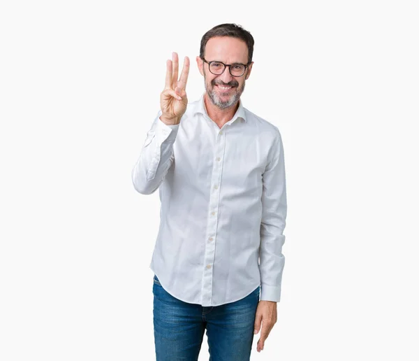 ハンサムな中年エレガントなシニア ビジネス男で眼鏡をかけて分離を示す背景と自信を持って 幸せな笑みを浮かべて 指で上向きナンバースリー — ストック写真