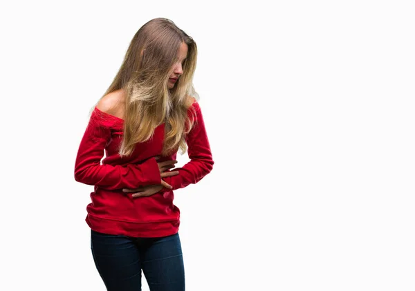 年轻美丽的金发碧眼的女人穿着红色毛衣在孤立的背景与手在胃因为恶心 痛苦的疾病感觉不适 Ache — 图库照片