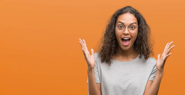 Beautiful Young Hispanic Woman Wearing Glasses Celebrating Crazy Amazed Success — Stock Photo, Image