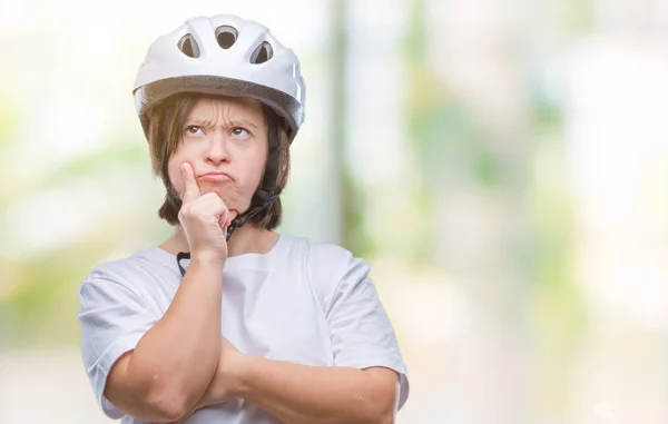 Молодая Женщина Велосипедистка Синдромом Дауна Защитном Шлеме Изолированном Фоне Рукой — стоковое фото