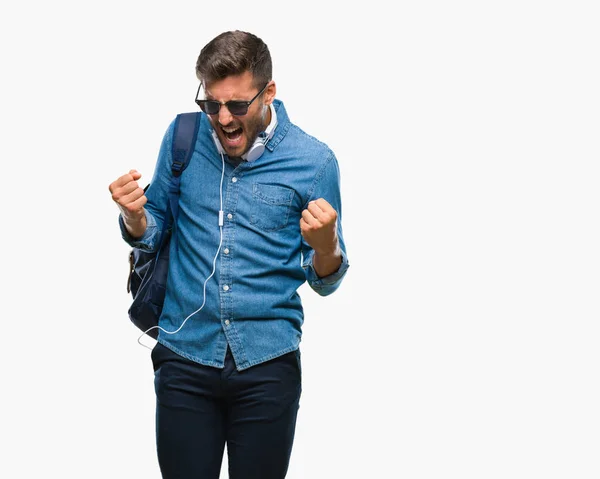 Joven Hombre Guapo Turista Con Auriculares Mochila Sobre Fondo Aislado —  Fotos de Stock