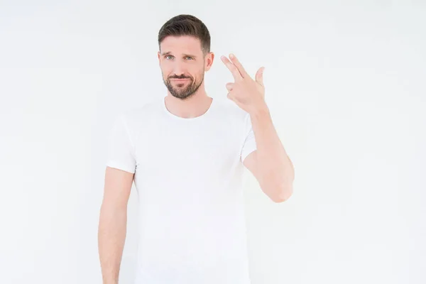 Ung Vacker Man Bär Casual Vit Shirt Över Isolerade Bakgrund — Stockfoto