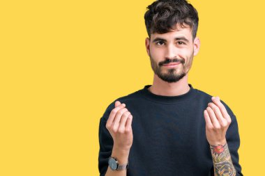 Maaş ödeme için milyoner iş soran izole arka plan yapıyor para hareketi el ile genç yakışıklı adam