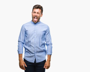 Yakışıklı delikanlı dilini izole arka plan üzerinde out komik ifade ile mutlu. Duygu kavramı.