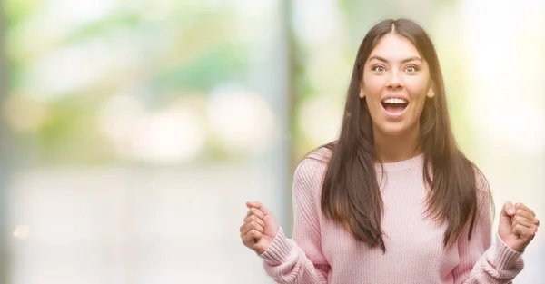 Young Beautiful Hispanic Woman Wearing Sweater Celebrating Surprised Amazed Success — Stock Photo, Image