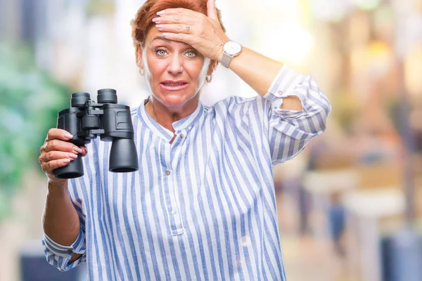 Senior Caucasian Woman Looking Binoculars Isolated Background Stressed Hand Head — Stock Photo, Image