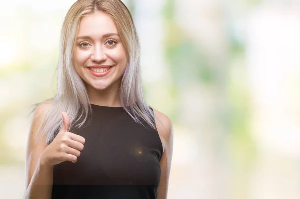 Молода Блондинка Над Ізольованим Тлом Робить Щасливі Великі Пальці Вгору — стокове фото