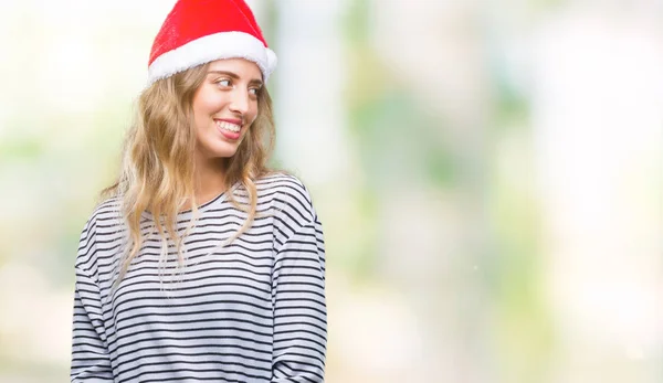 Mooie Jonge Blonde Vrouw Kerstmuts Dragen Geïsoleerd Achtergrond Zoek Weg — Stockfoto