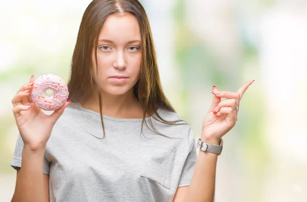 Young Caucasian Woman Eating Sweet Donut Isolated Background Very Happy — Stock Photo, Image