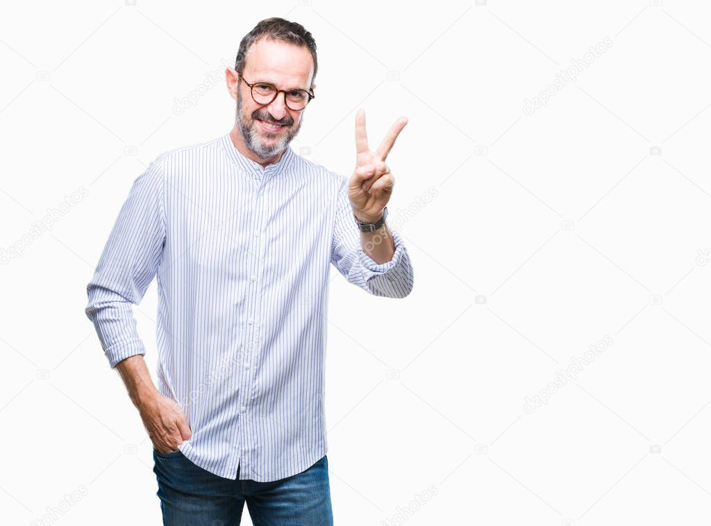 Middle age hoary senior man wearing glasses over isolated background smiling with happy face winking at the camera doing victory sign. Number two.
