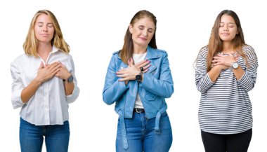 Kolaj bir grup ile gülümseyen izole beyaz zemin üzerinde üç güzel kadınların göğüs kapalı gözler ve yüzünde minnettar jest ile eller. Sağlık kavramı.