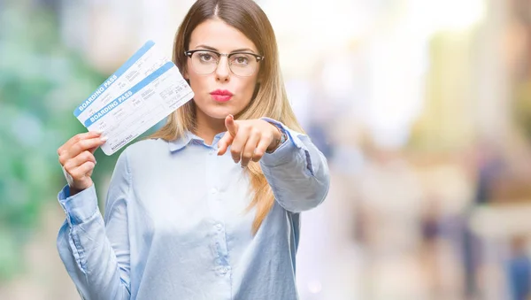 Young Beautiful Woman Holding Boarding Pass Isolated Background Pointing Finger — Stock Photo, Image