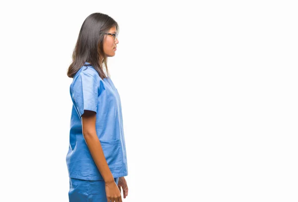 Young Asian Doctor Woman Isolated Background Looking Side Relax Profile — Stock Photo, Image