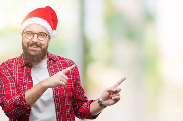 Young Caucasian Man Wearing Christmas Hat Isolated Background Smiling Looking — Stock Photo, Image