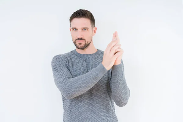Young Handsome Man Wearing Casual Sweater Isolated Background Holding Symbolic — Stock Photo, Image