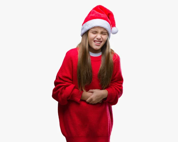 年轻美丽的女孩戴着圣诞帽在孤立的背景上 手放在肚子上 因为消化不良 痛苦的疾病感觉不舒服 Ache — 图库照片